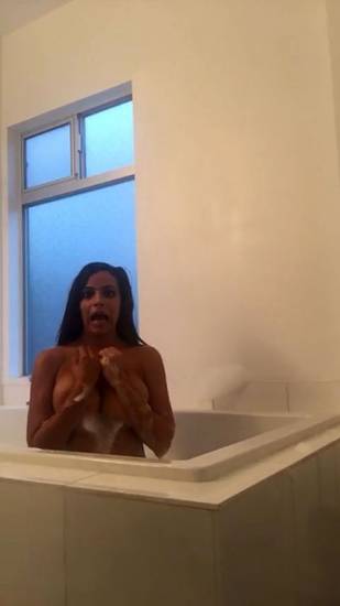 Vida Guerra topless in the bathtub