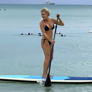 Megyn Kelly surfing in a bikini