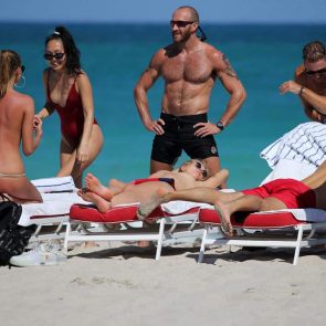 Toni Garrn lying on a sunbed