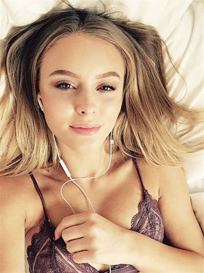 Zara Larsson naked in bed