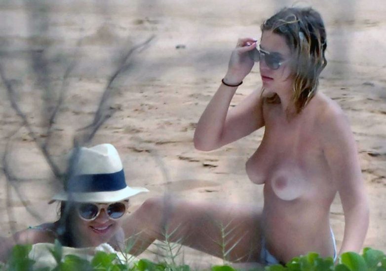 Ashley Benson nude boobs on the beach