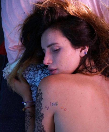 Bella Thorne naked on the bed from behind