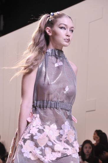 Gigi Hadid's nipples in a transparent dress