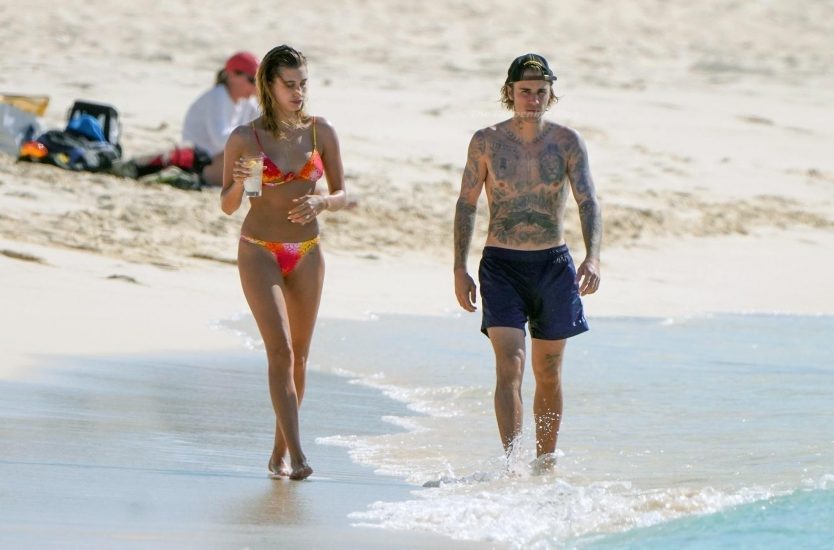 Hailey Baldwin in a swimsuit with JB