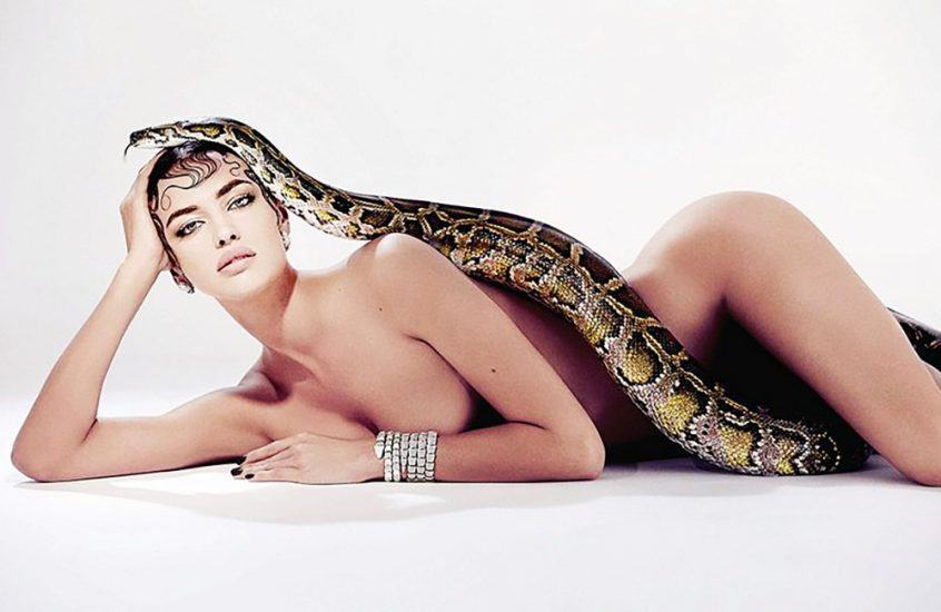 Irina Shayk poses with a snake