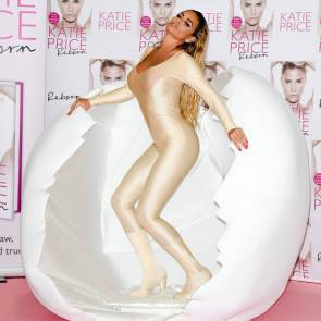 Katie Price promoting her book while hatching an egg