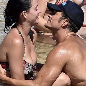 Katy Perry and Orlando Bloom playing in the shallows