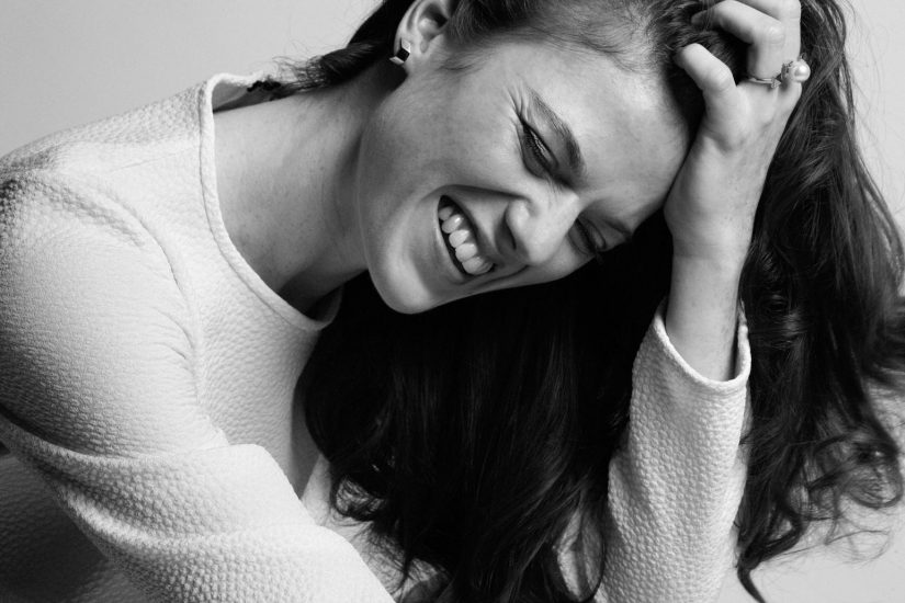 Rose Leslie smiles