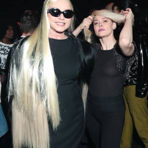 Rose McGowan with a friend at the opening of the Chorleywood exhibition in New York