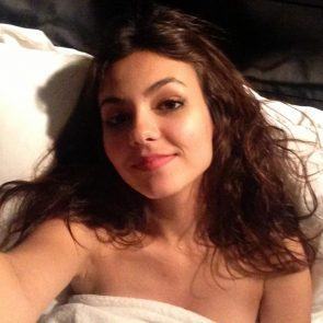 Victoria Justice topless on bed