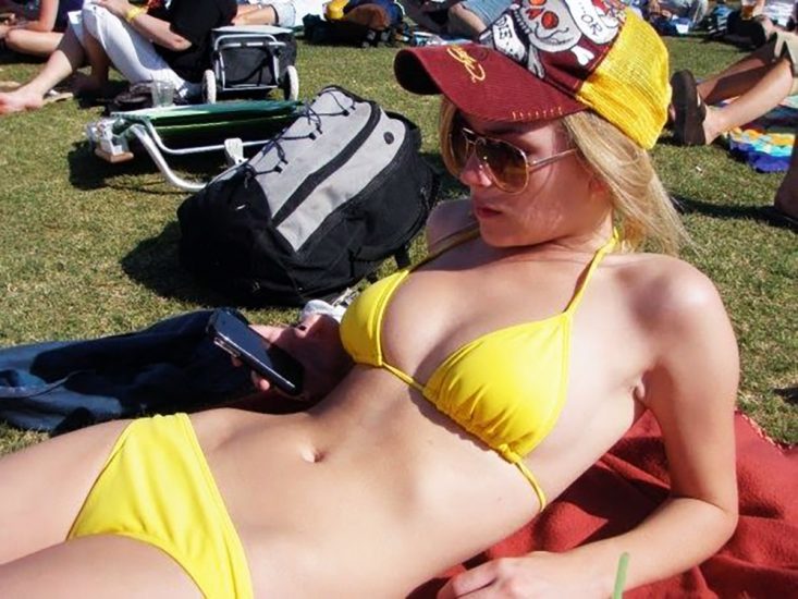 Britt Robertson in a yellow bikini