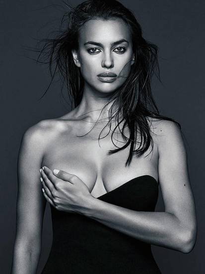 Irina Shayk holds an owl in her hand