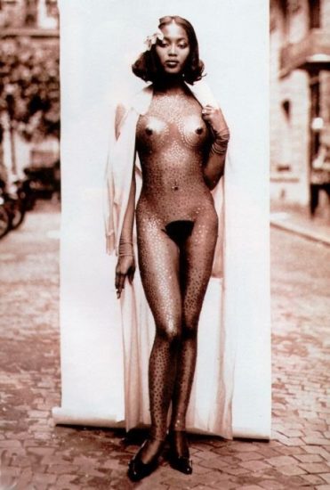 Naomi Campbell stood in the street completely naked