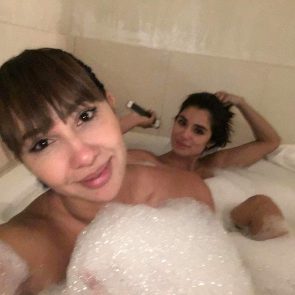 Jackie Cruz getting soaked in the bathtub with her friend