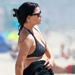 Neve Campbell's ass in bikini