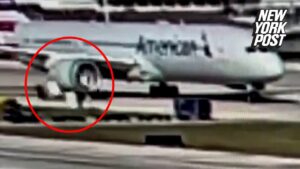 Wild video shows American Airlines plane sucking cargo container into engine